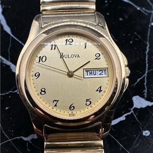 Bulova Gold Tone Watch with Day-Date Display